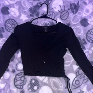 black long sleeve crop-top cross from front